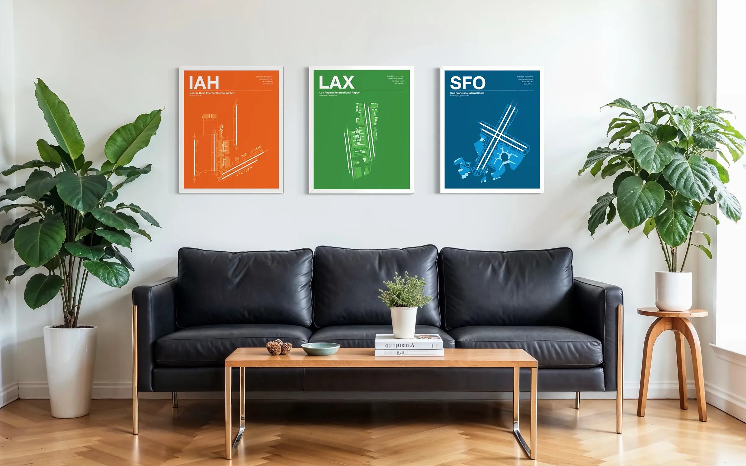 IAH, LAX, and SFO airport diagram prints displayed in a modern living room